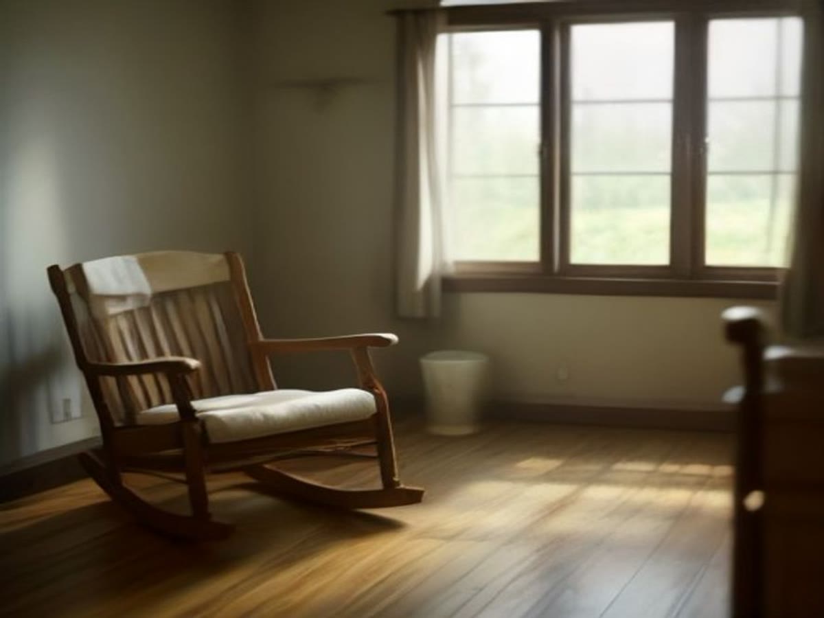 A warm living space with a rocking chair and blanket